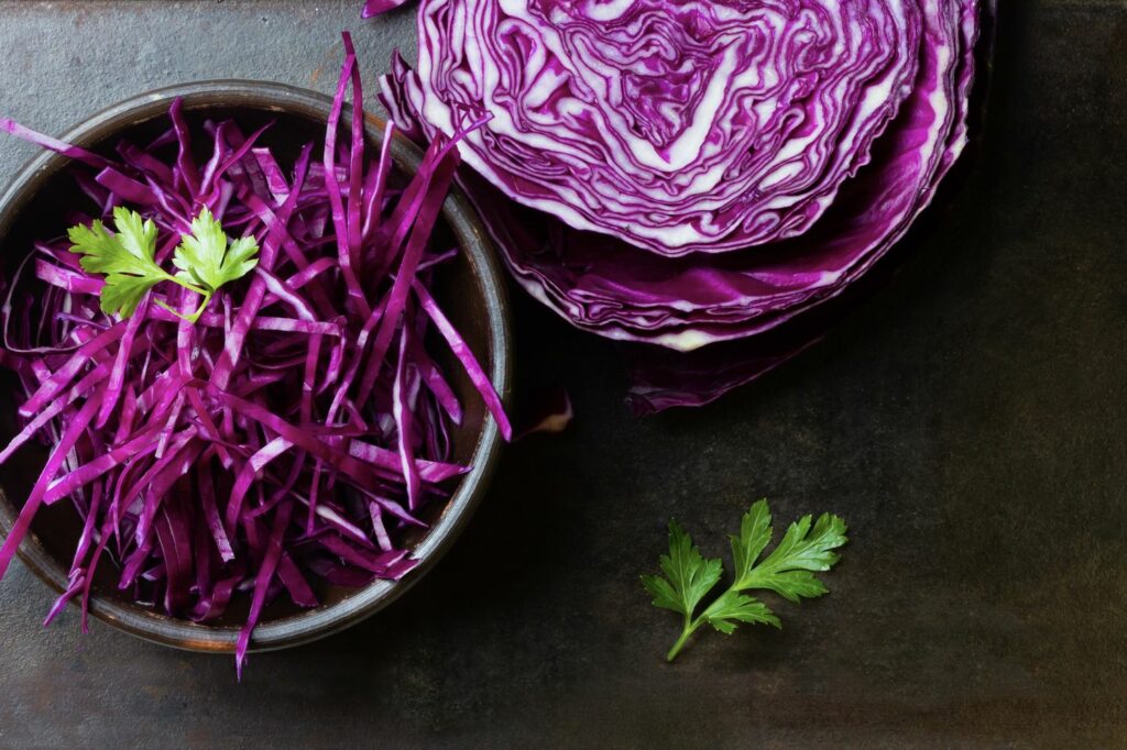 Shredded red cabbage in bowl