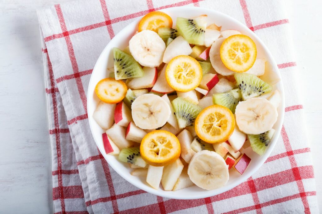 Kumquat slices in fruit salad