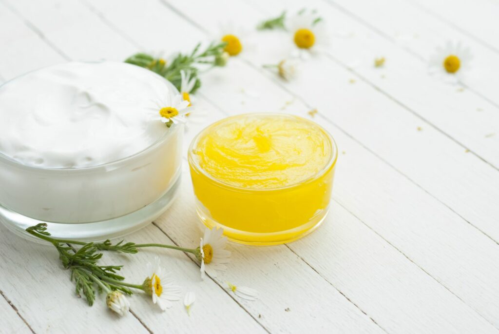 Calendula ointment, yoghurt and chamomile flowers
