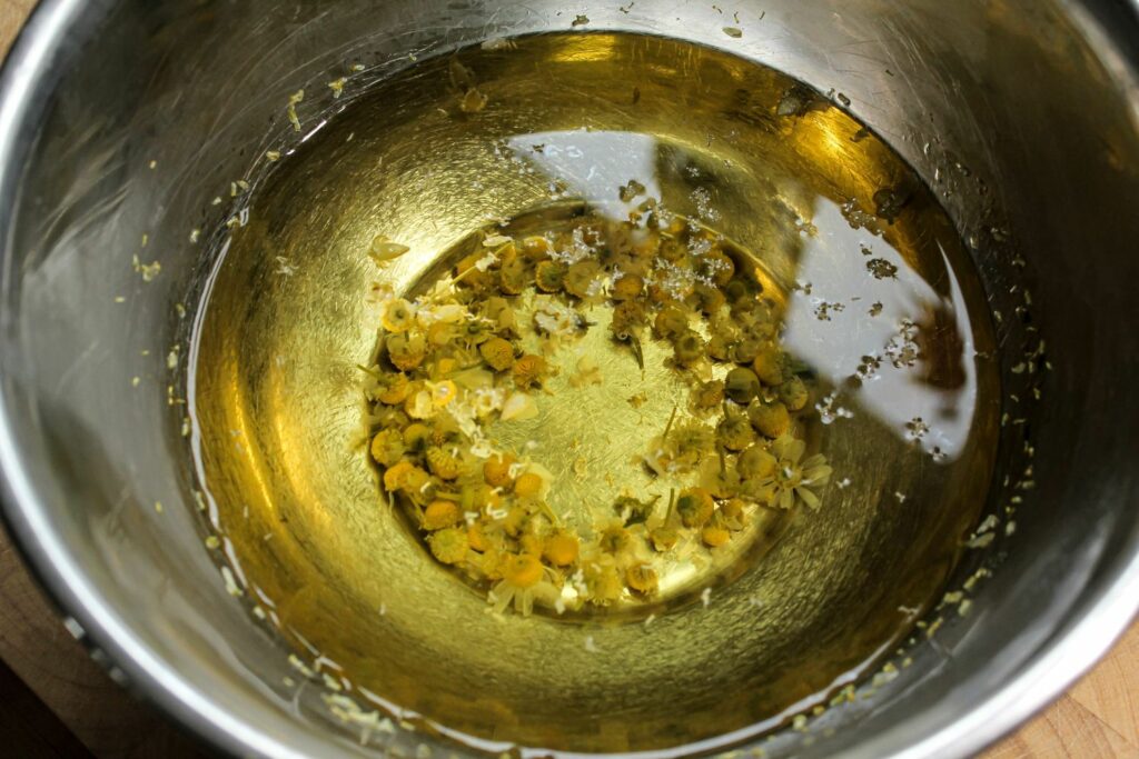 bowl of hot water with chamomile