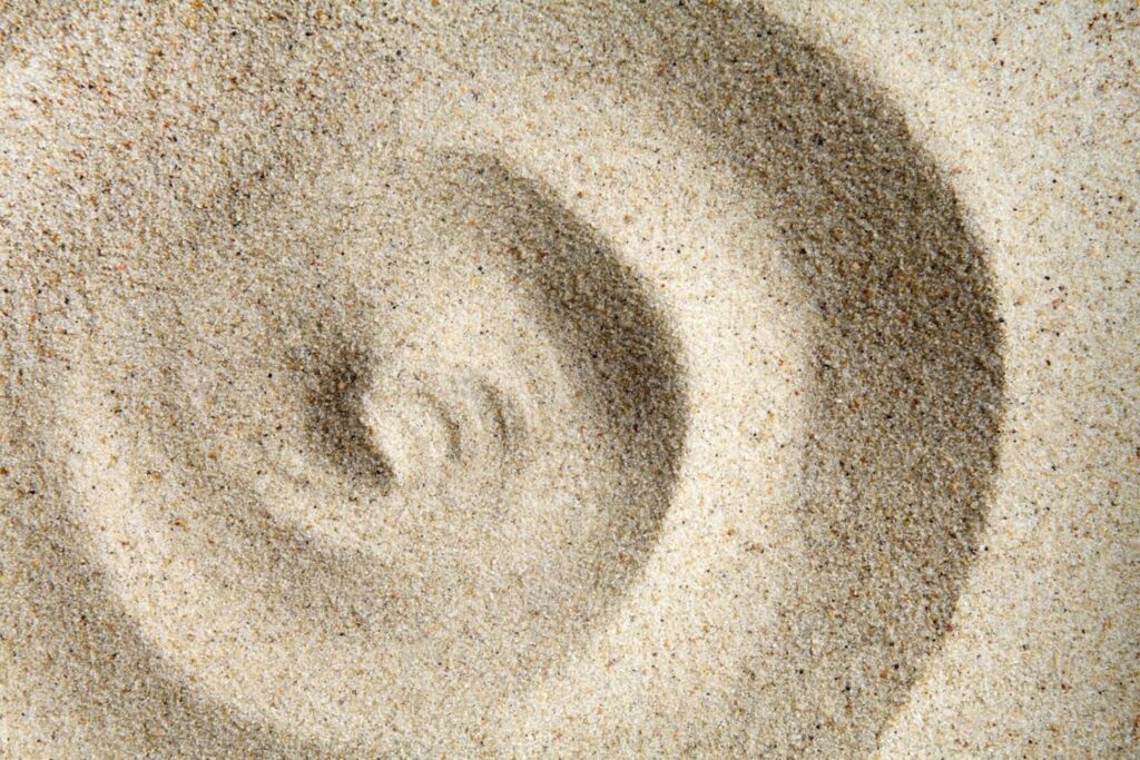 spiral design in sand
