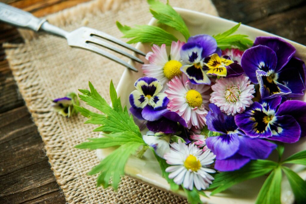 plate of colourful edible flowers