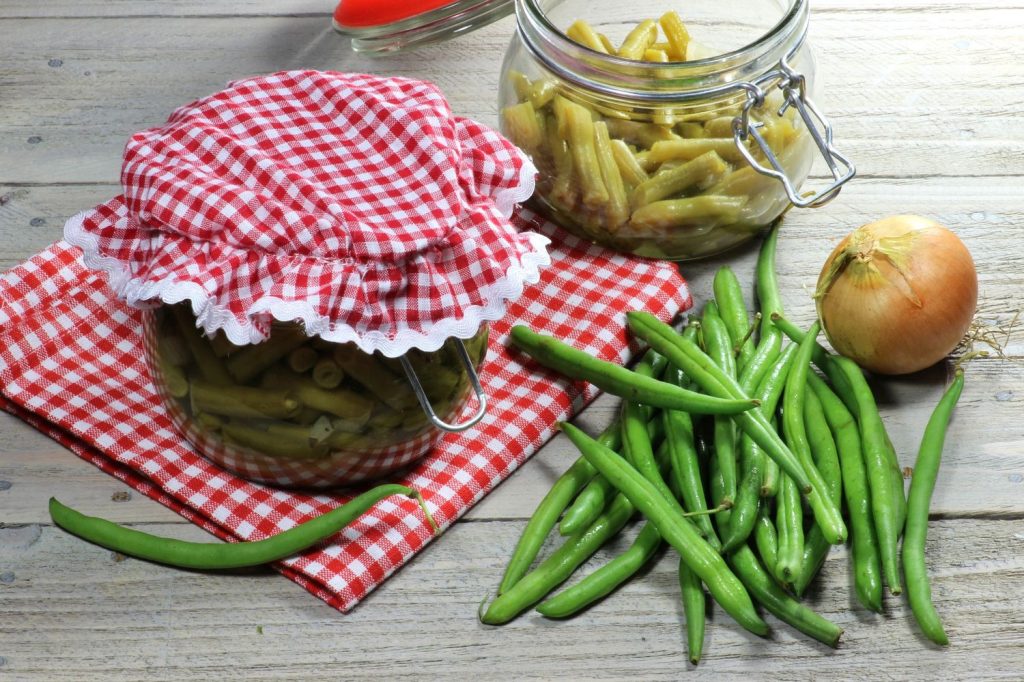 Jars of pickled French beans