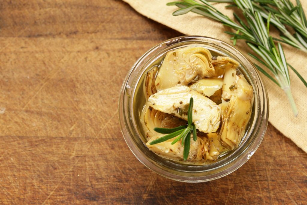 Oil pickled artichokes in jar